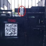 Photo of front gate with intercom highlighted