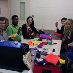 Attendees at the electro-sewing workshop sitting around a table