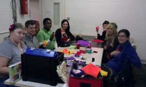 Attendees at the electro-sewing workshop sitting around a table