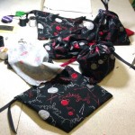 The drawstring bags made by the workshop attendees