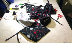 The drawstring bags made by the workshop attendees