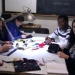 Some workshop attendees sitting around a table