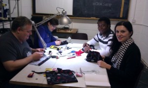 Some workshop attendees sitting around a table