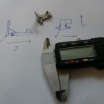 Part, sketched diagram and calipers.